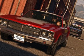 GTA 5: Michael in a red sports car.